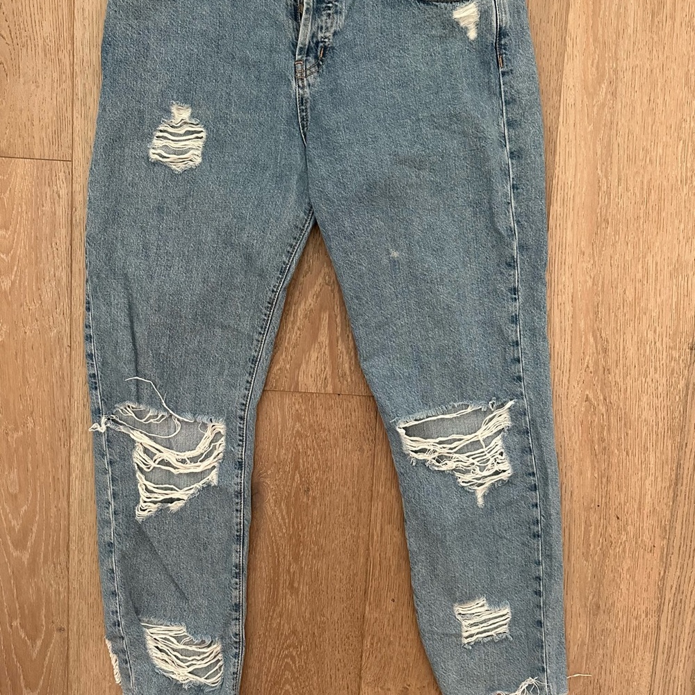 Distressed Blue Denim Jeans
